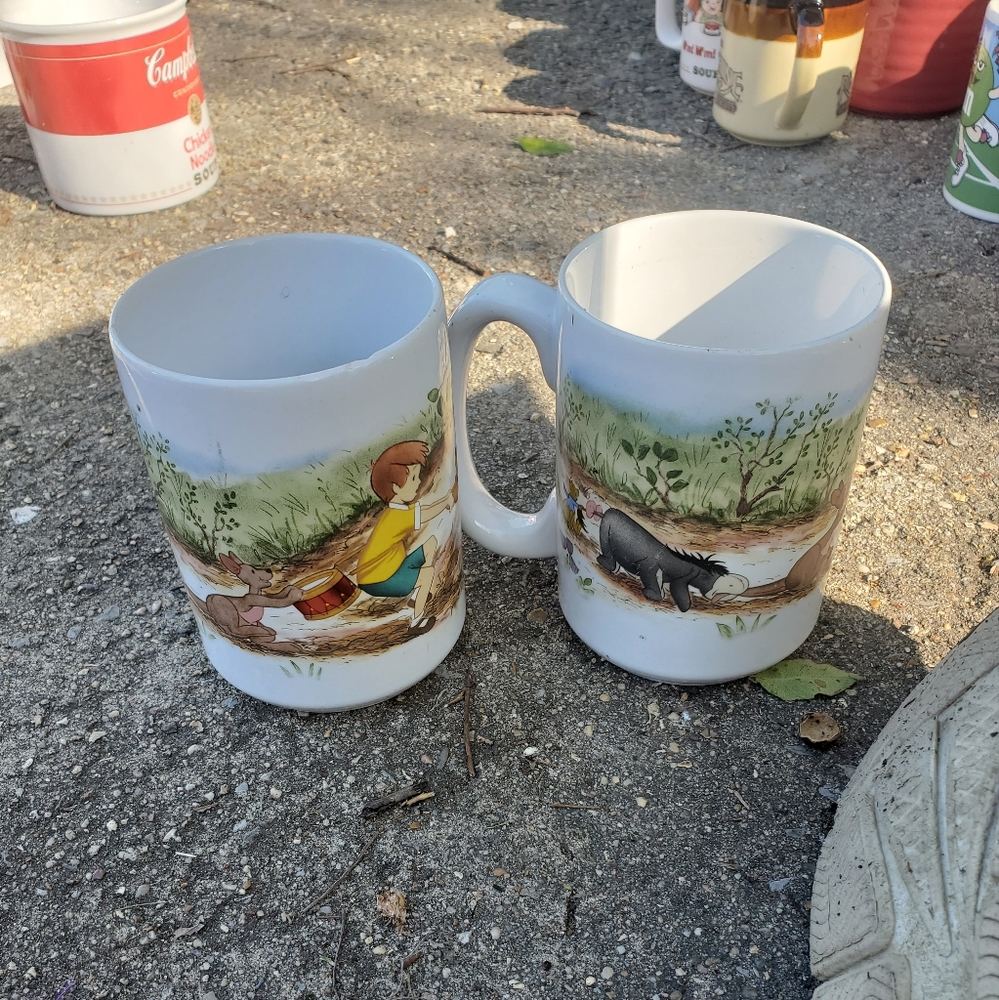 Pooh bear set of mugs.